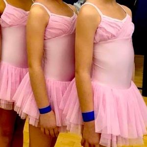Size 6/6x girls. Two baby pink tutu leotards. Worn once.